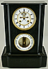 197. A French Bourdon barometer with clock, signed 'Richard A Paris', circa: 1855-1860.