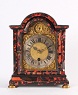 An attractive South German small red tortoishell and ebonized bracket timepiece with automaton, circa 1740.