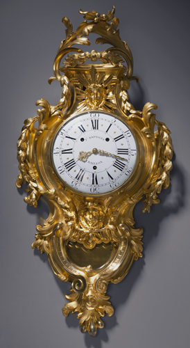 A very rare Louis XV gilt bronze cartel clock of circa 14 day duration, signed on the white enamel dial Jn Baptiste Baillon