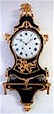 Neuchatel (Switzerland) Louis XVI wall clock. Stamped guilded brass typical from neuchatel clocks of the 18th century.