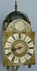 A handsome arched dial hourly striking lantern clock with alarmwork and half-hour striking made about 1700 by Robert Trippett of London.