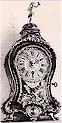 Bracket (Cartel) clock with a brown inlaid Boulle (marquetterie) case. LE VACHER À FÈCAMP