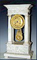A white marble and ormolu portico clock. France ca 1840. €. 2200,-