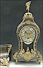 A small fine French Cartel clock signed G.I. Champion a Paris.